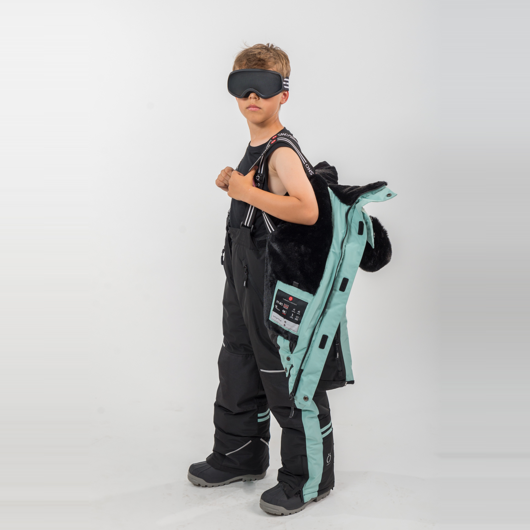 Person wearing a futuristic suit with a backpack on a white background